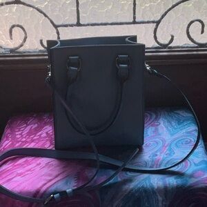 Sky blue leather Patricia Nash crossbody bag.